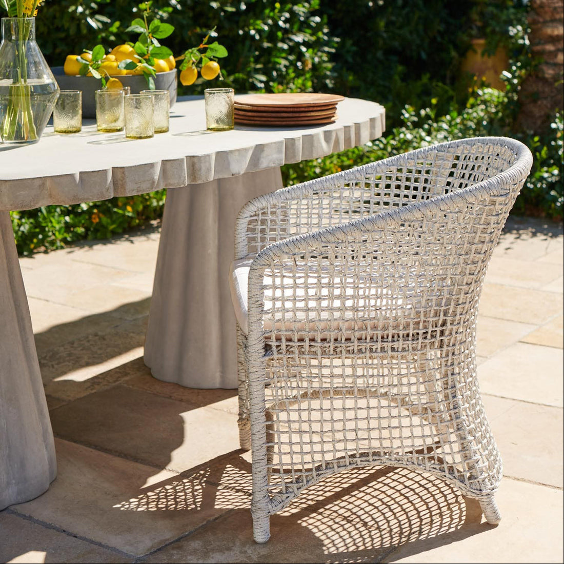 Made Goods Helena Open-Weave Barrel Outdoor Dining Chair in Danube